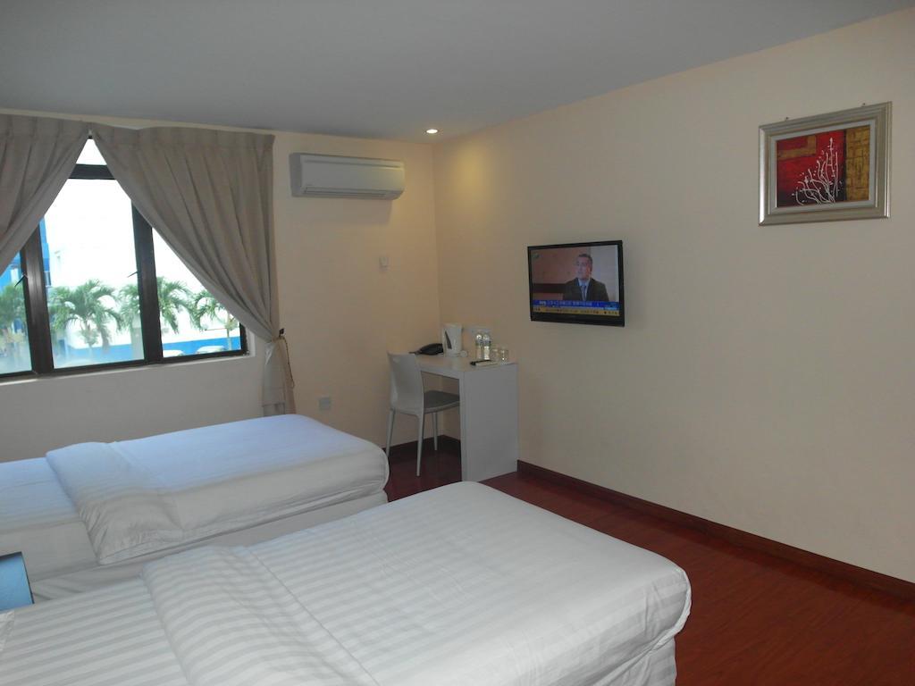 Mcity Inn Miri Pokój zdjęcie